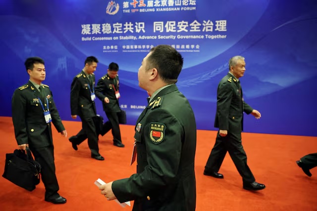 Military delegates walk outside the venue of the opening ceremony for the Beijing Xiangshan Forum in Beijing, China September 16, 2026. REUTERS/Florence Lo 