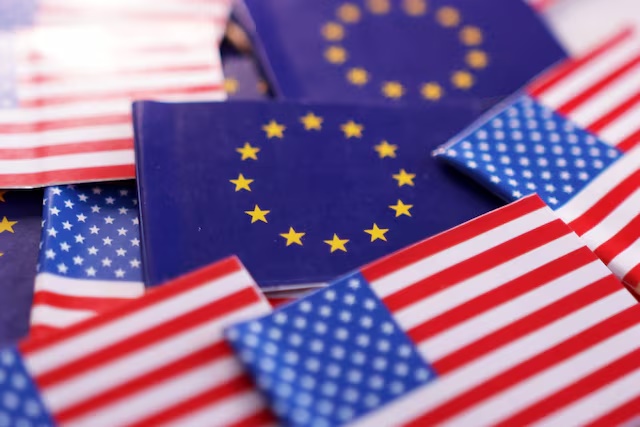 U.S. and European Union flags are seen in this illustration taken March 20, 2025. REUTERS/Dado Ruvic/Illustration 