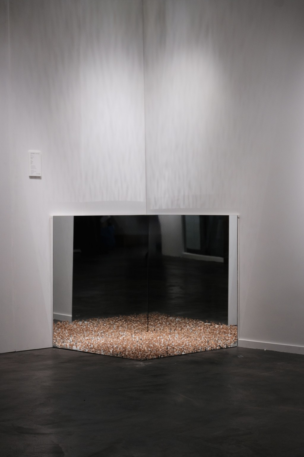 More than 800 hand-shaped ceramic cigarette butts capture traces of exhausted goodbyes and suspended moments where private emotion quietly lingers in public space.