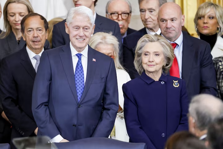 Former U.S. President Bill Clinton and former U.S. Secretary of State Hillary Clinton arrive for Donald Trump's inauguration as the next President of the United States in the Rotunda of the United States Capitol in Washington, U.S., January 20, 2025. SHAWN THEW/POOL/Pool via REUTERS/File Photo