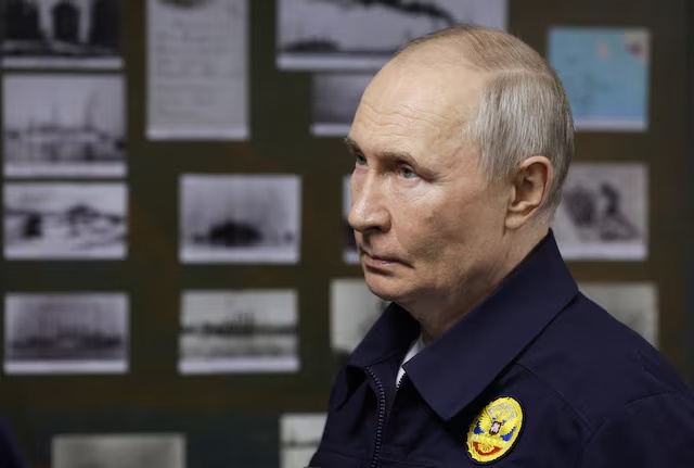 Russian President Vladimir Putin visits a missile cruiser “Varyag” as he observes a military drill of Pacific fleet, in Russia's far eastern Sakhalin Region, Russia, August 12, 2026. Sputnik/Gavriil Grigorov/Pool via REUTERS
