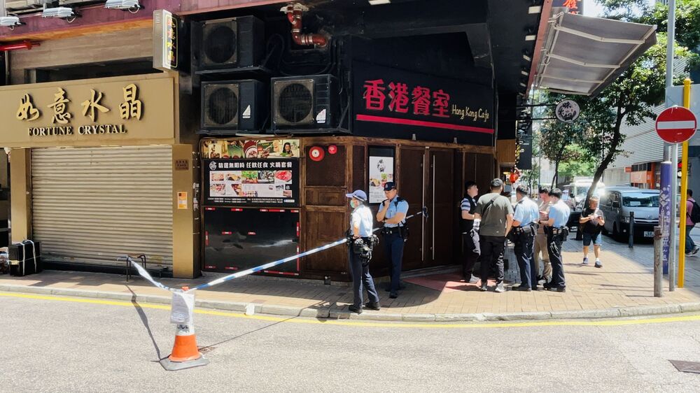 Police cordon off the area in Tsim Sha Tsui where the girl was allegedly abducted. A sneaker believed to be belonging to the girl is left on the street curb. Police cordon off the area in Tsim Sha Tsui where the girl was allegedly abducted. A sneaker believed to be belonging to the girl is left on the street curb.