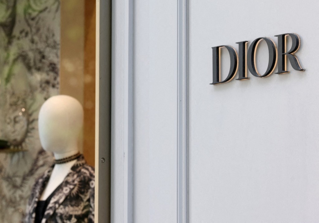 A logo of fashion house Dior is seen outside a shop in Paris, France. REUTERS