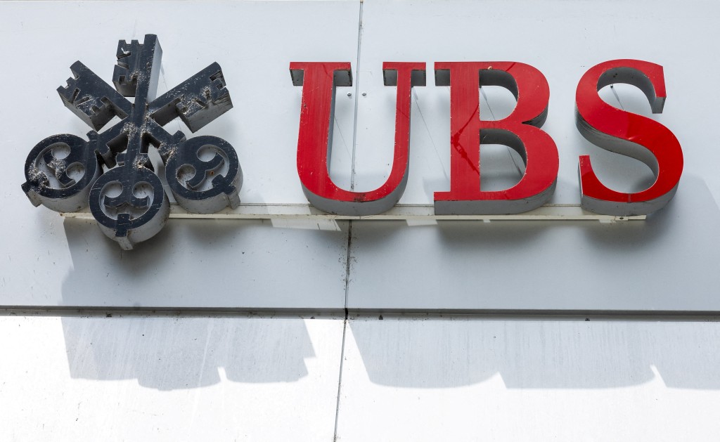 FILE PHOTO: A UBS logo is pictured on the branch of the Swiss bank in Lucerne, Switzerland, June 14, 2024.  REUTERS/Denis Balibouse/File Photo