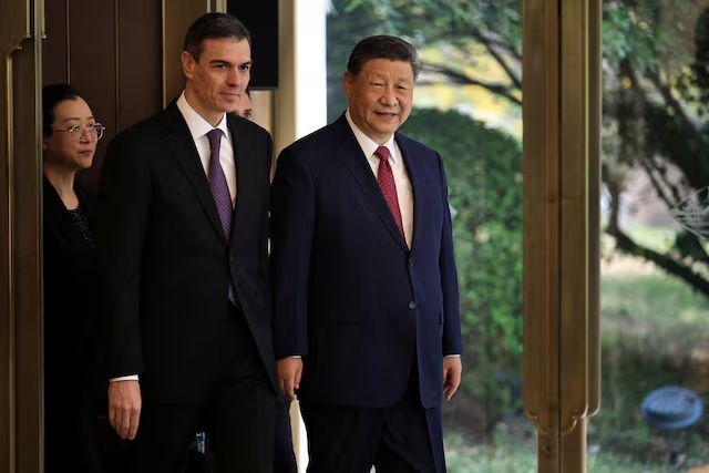 Chinese President Xi Jinping (R) and Spanish Prime Minister Pedro Sanchez (L) arrive to a bilateral meeting at Diaoyutai Guest House in Beijing, China, 11 April, 2025. ANDRES MARTINEZ CASARES/Pool via REUTERS/File Photo
