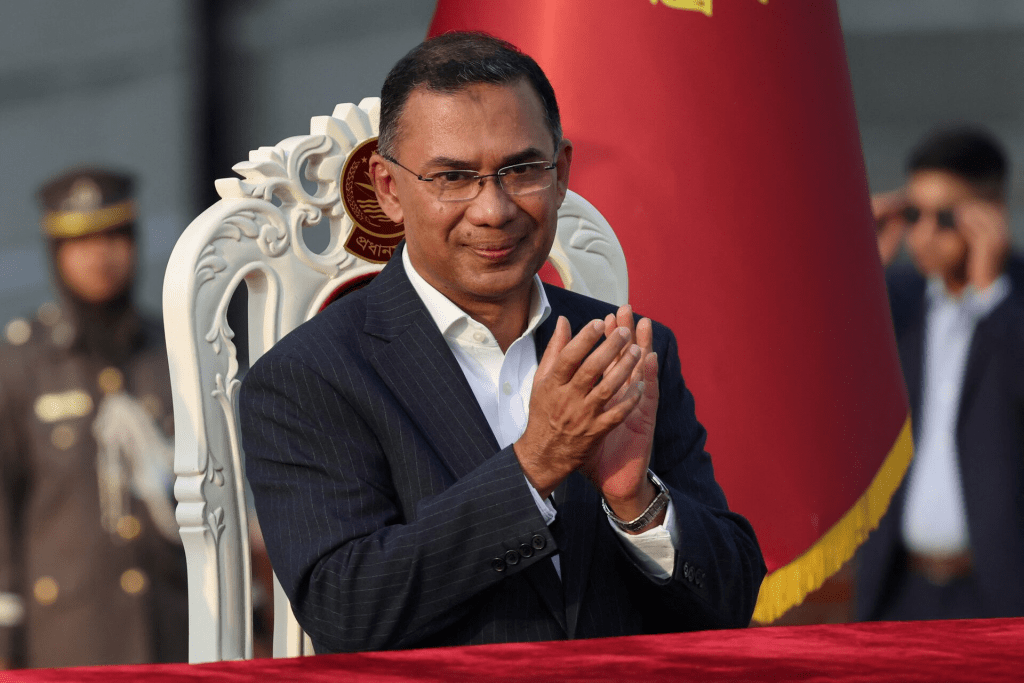 angladesh’s newly sworn in Prime Minister Tarique Rahman claps during an oath taking ceremony at the South Plaza of the parliament building, following BNP's landslide victory in the national polls, in Dhaka, Bangladesh, February 17, 2026. REUTERS/Mohammad Ponir Hossain