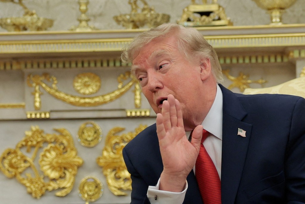 U.S. President Donald Trump speaks as he hosts 16-year-old lifeguard Ryder Williams, who saved a child off the coast of Santa Cruz, California, last month, Nathaniel Rai, the child saved by Williams, and Nathaniel's family members in the Oval Office at the White House in Washington, D.C., U.S., August 17, 2026. (Reuters)