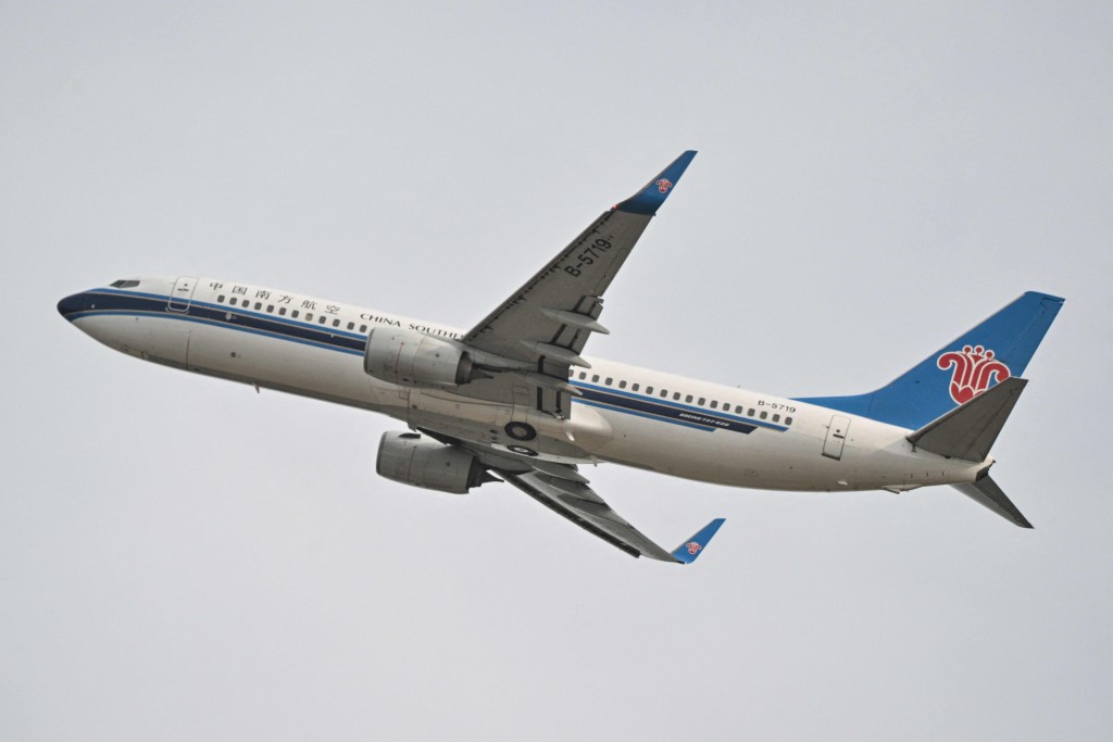 A China Southern Airlines Boeing 737-81B aircraft takes off from Zhuhai Jinwan Airport in Zhuhai, in southern China's Guangdong province on November 27, 2025. AFP