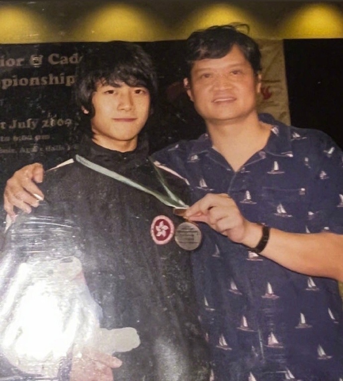 Wang’s father (right), Wang Ruiji, was an Asian Games gold medalist and Olympic fencer.