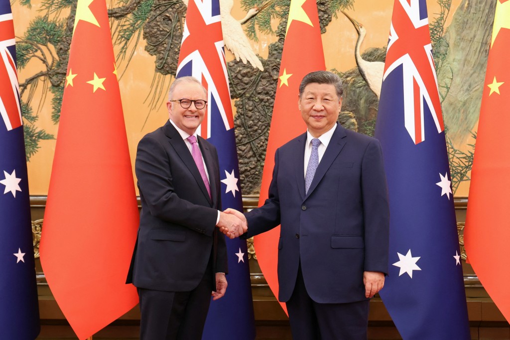 Chinese President Xi Jinping and Australian Prime Minister Anthony Albanese shake hands at the Great Hall of the People in Beijing, China July 15, 2025. (Reuters)