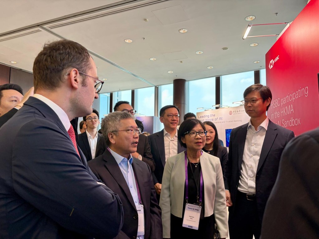 Arthur Yuen (second left), HKMA's executive director of banking supervision Carmen Chui (second right), David Liao (right), at the Finance+A.I. Forum in Hong Kong on Thursday.
