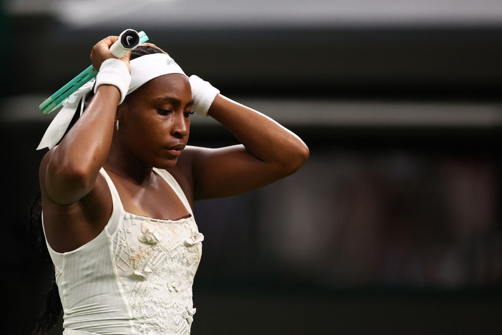 US player Coco Gauff reacts as she plays against Ukraine's Dayana Yastremska during their women's singles first round tennis match on the second day of the 2025 Wimbledon Championships. (AFP)