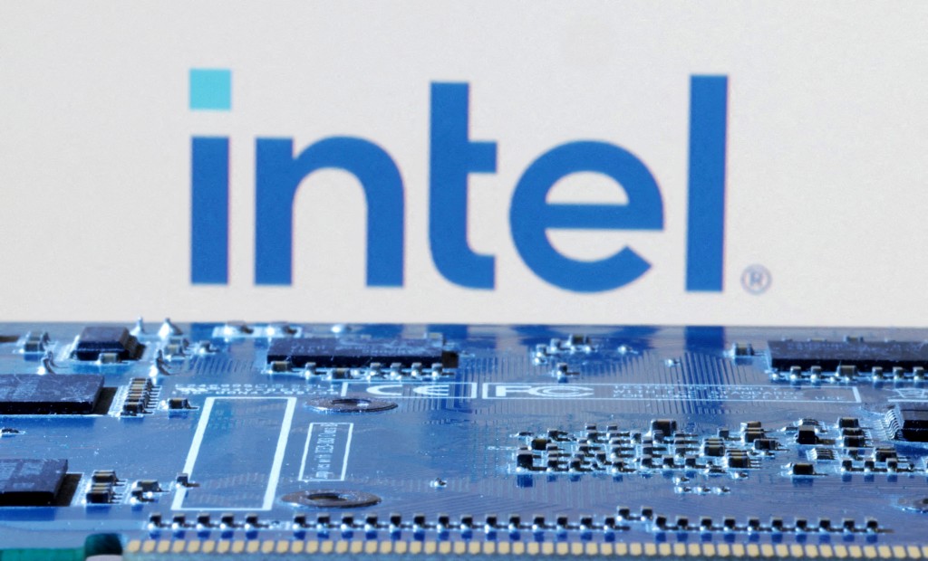 Intel logo is seen near computer motherboard in this illustration created on January 8, 2024. REUTERS/Dado Ruvic/Illustration/File Photo