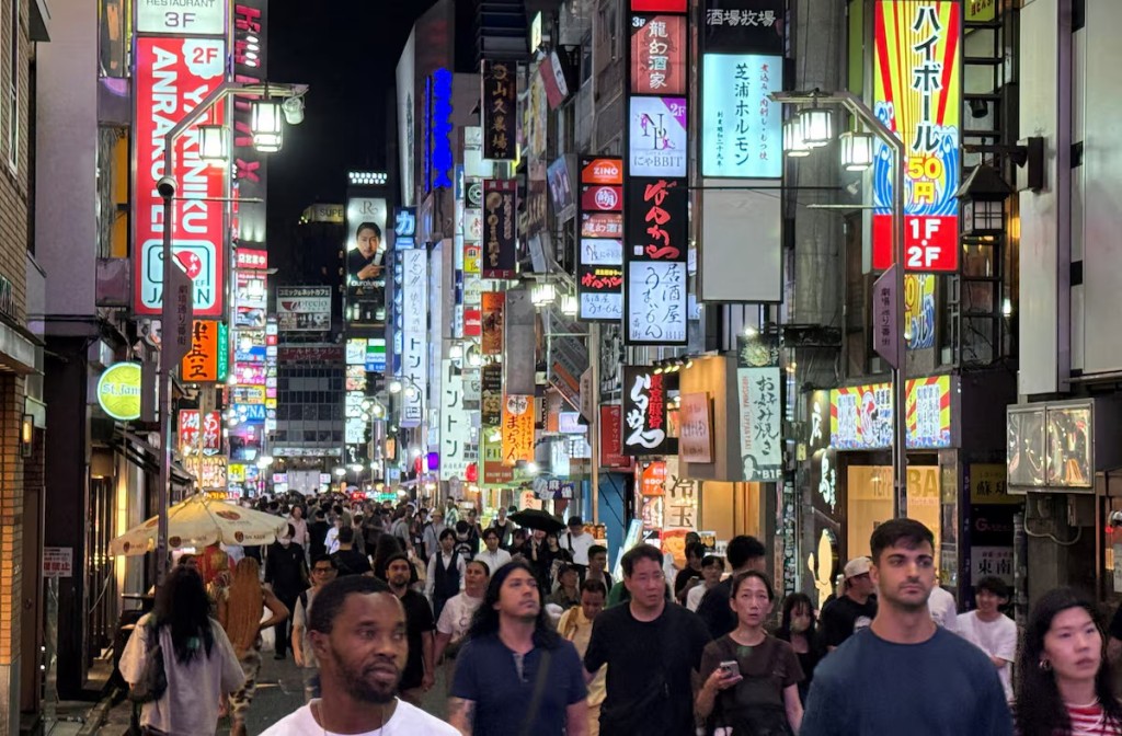 People walk at a shopping area of Shinjuku in Tokyo, Japan, September 11, 2025. REUTERS