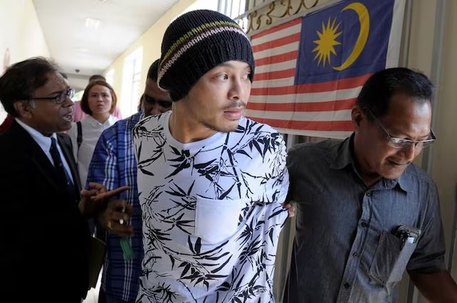 Malaysian rapper Wee Meng Chee, whose stage name is Namewee, is pictured leaving a courtroom in Penang, Malaysia August 25, 2016. REUTERS/Stringer/Files 