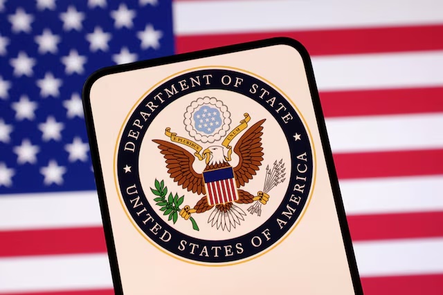 United States Department of State logo and U.S. flag are seen in this illustration taken April 23, 2025. REUTERS/Dado Ruvic/Illustration