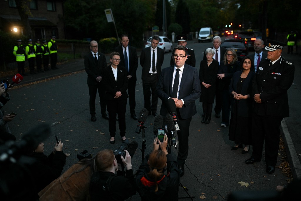 Mayor of Greater Manchester, Andy Burnham speaks to members of the media near to Heaton Park Hebrew Congregation synagogue in Crumpsall, north Manchester, on October 2, 2025, following an attack at the synagogue.  (Photo by Oli SCARFF / AFP)