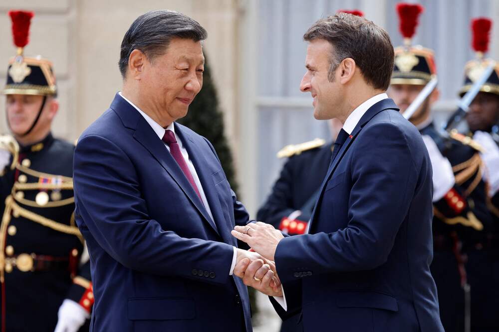 Xi Jinping exchanges greetings with Emmanuel Macron and Ursula von der Leyen at the Elysee Presidential Palace in Paris. AFP, BLOOMBERG Xi Jinping exchanges greetings with Emmanuel Macron and Ursula von der Leyen at the Elysee Presidential Palace in Paris. AFP, BLOOMBERG