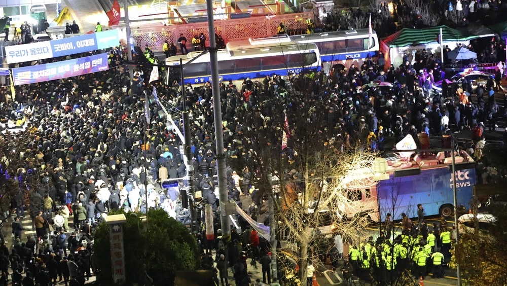 People gather to demand South Korean President Yoon Suk Yeol step down in front of the National Assembly in Seoul, South Korea, Wednesday, Dec. 4, 2024. (AP)