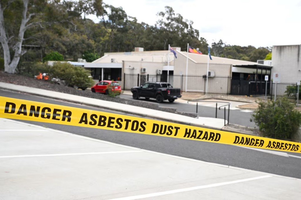  Asbestos warning tape is seen at Black Mountain School in Canberra, Australia, November 17, 2025. Almost 70 public schools in Canberra will be closed today due to potential asbestos contamination. Lukas Coch/AAP/via REUTERS