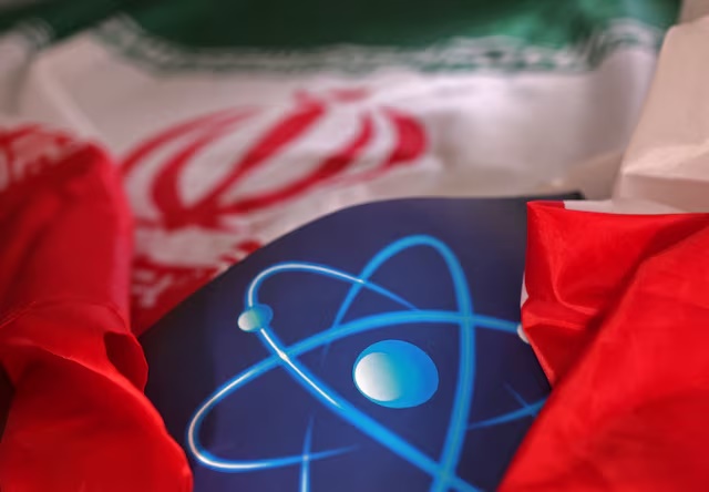 Atomic symbol and Iranian flag are seen in this illustration taken September 8, 2022. REUTERS/Dado Ruvic/Illustration/File Photo Atomic symbol and Iranian flag are seen in this illustration taken September 8, 2022. REUTERS/Dado Ruvic/Illustration/File Photo