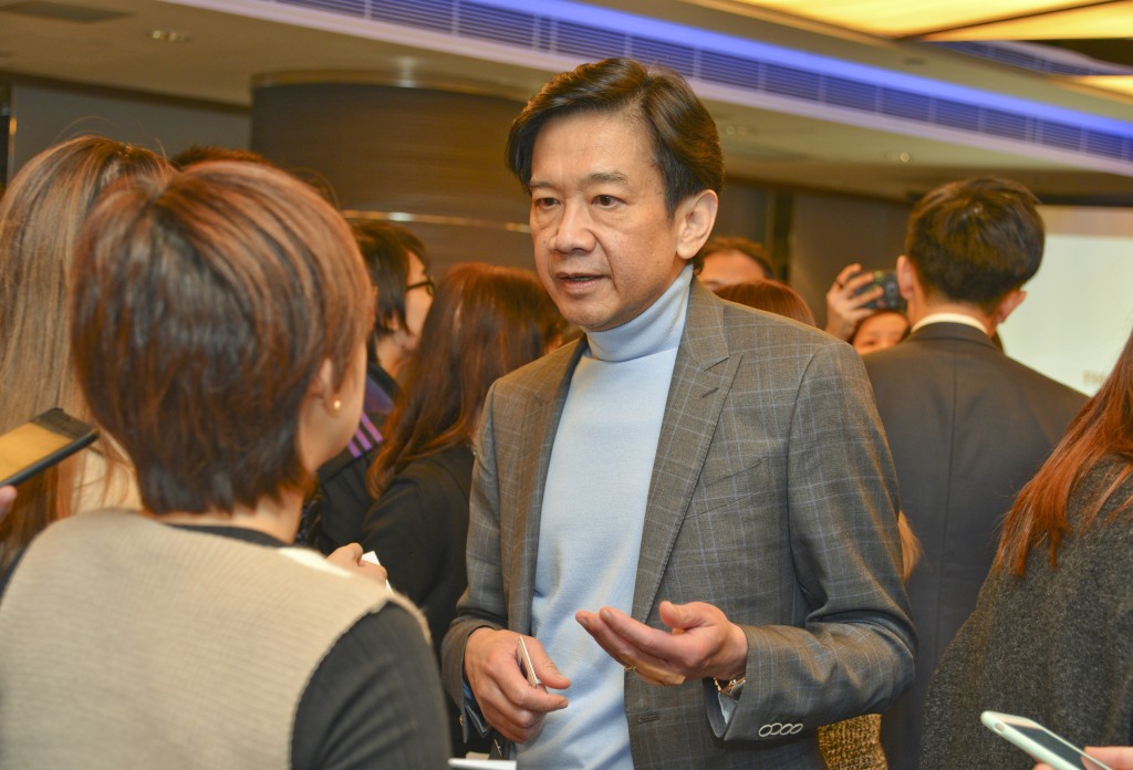Dickson Poon. Sing Tao