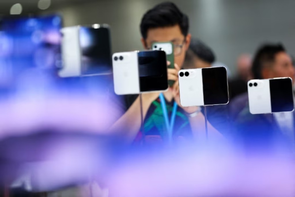New foldable iPhone Duo devices on display during Apple's event at the Steve Jobs Theater in Cupertino, California, U.S. September 9, 2026. REUTERS/Carlos Barria 