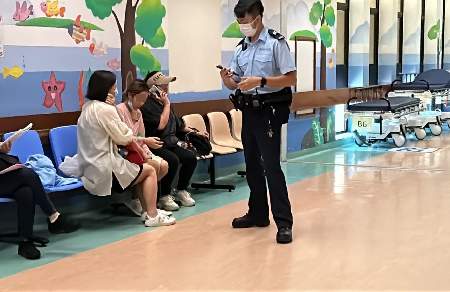 The girls' mother, center, and relatives wait for news about their condition at the hospital. The girls' mother, center, and relatives wait for news about their condition at the hospital.