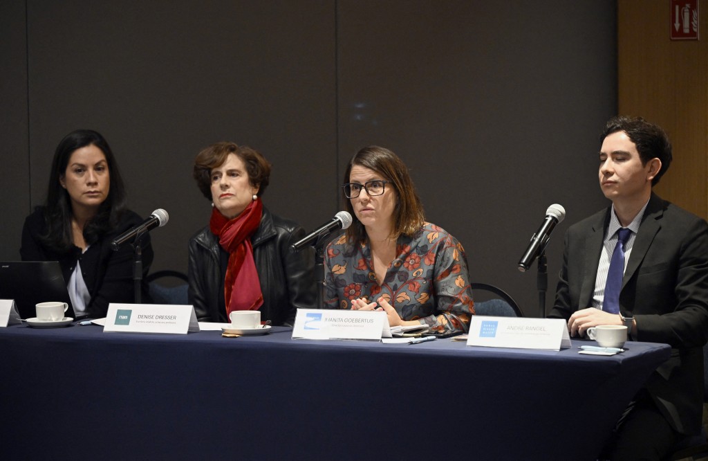 (L to R) Lisa Sanchez from Mexico United Against Crime, Denise Dresser, professor and political analyst at ITAM, Juanita Goebertus from Human Rights Watch, and Andre Rangel, communications director for the Americas at Human Rights Watch, attend a presentation on their analysis of the situation in Latin America as part of the launch of HRW's global report, in Mexico City on February 4, 2026. (Photo by Alfredo ESTRELLA / AFP)