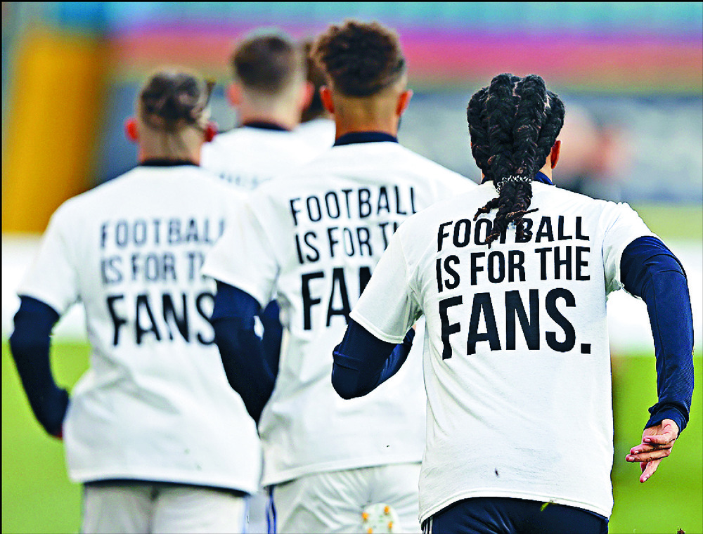 Whether inside or outside Elland Road for their Premier League match against Leeds, Liverpool players see reminders of the fan backlash over the club owners' decision to join the planned breakaway European Super League. AFP, REUTERS, AP  