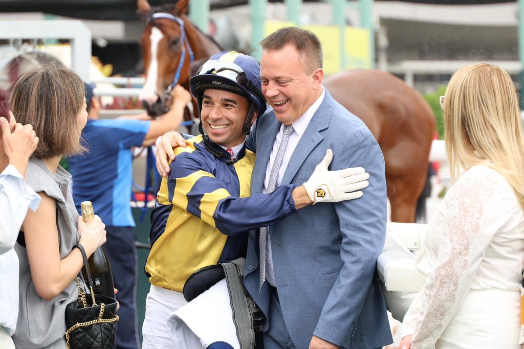 Joao Moreira and Caspar Fownes celebrate Verbier's win on Saturday at Sha Tin. Fownes wants the HKJC to grant Moreira a full-time license. Sing Tao
