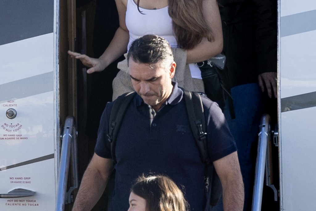 Photo by RICARDO ARDUENGO / AFP  Flavio Bolsonaro steps off a plane after arriving at Opa Locka Executive Airport in Miami, Florida on October 28, 2026.