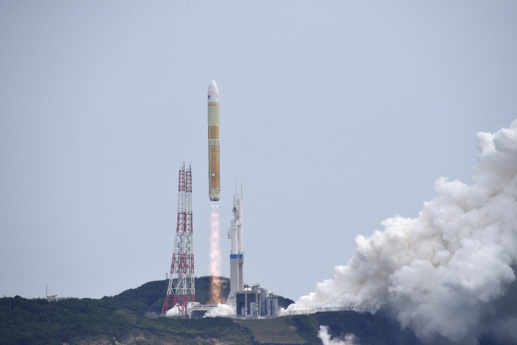 The H3 rocket No. 6 is launched at Tanegashima Space Center in Kagoshima Prefecture on June 12, 2026. (Photo by JIJI PRESS / AFP) / JAPAN OUT