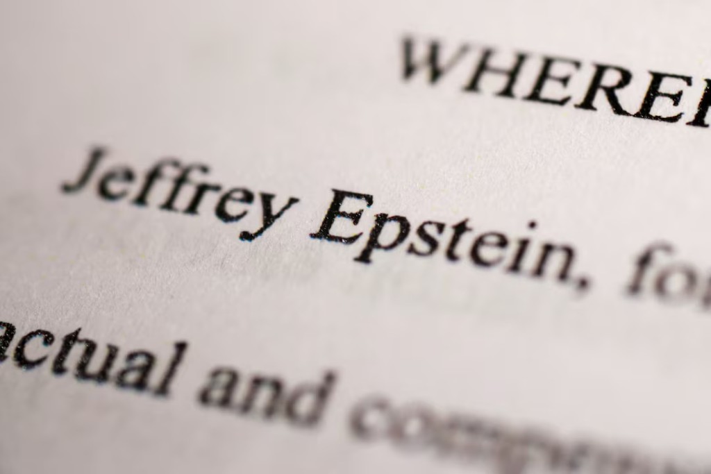  Newly-released documents from disgraced late financier and sex offender Jeffrey Epstein, referencing court cases against him, are seen in this handout released by the U.S. Justice Department and printed and arranged for a photograph by Reuters in Washington, D.C., U.S., December 19, 2025. REUTERS/Jonathan Ernst/File Photo 