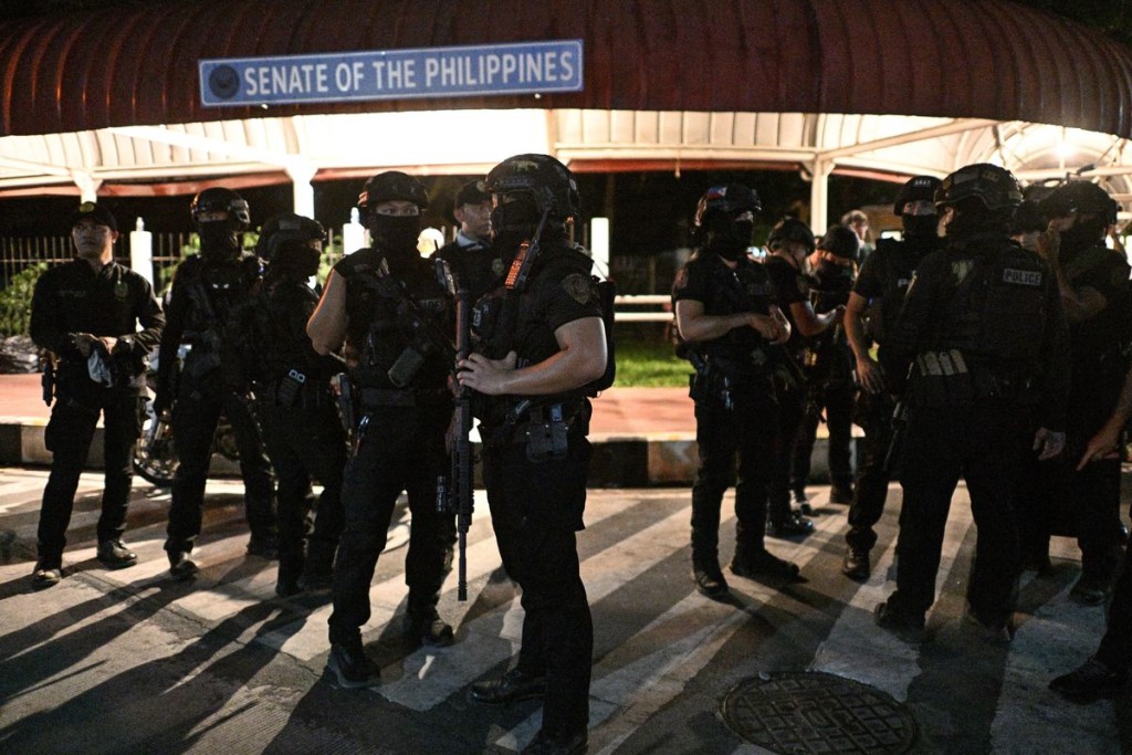 SWAT members stand outside the Philippine Senate. Reuters