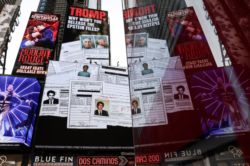 A screen about the Jeffrey Epstein files is displayed at Times Square in New York City, U.S., July 23, 2025. REUTERS/Jeenah Moon 