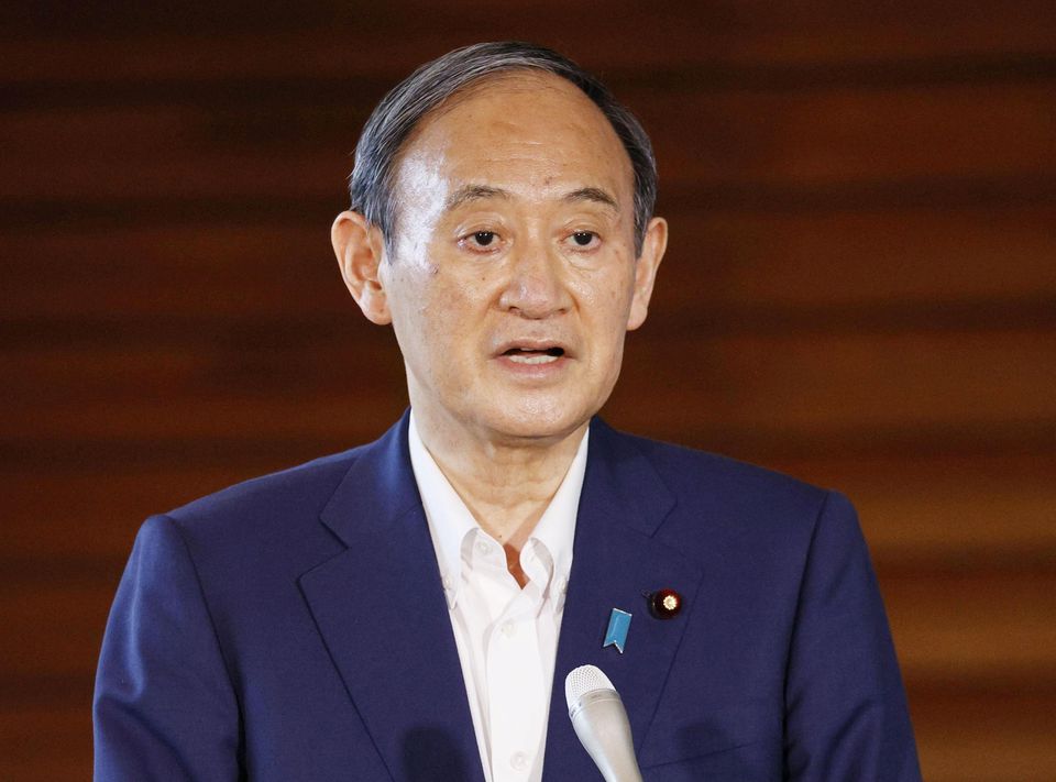 Japan's Prime Minister Yoshihide Suga speaks to media after he annouced to pull out of a party leadership race at his official residence in Tokyo. Japan's Prime Minister Yoshihide Suga speaks to media after he annouced to pull out of a party leadership race at his official residence in Tokyo.