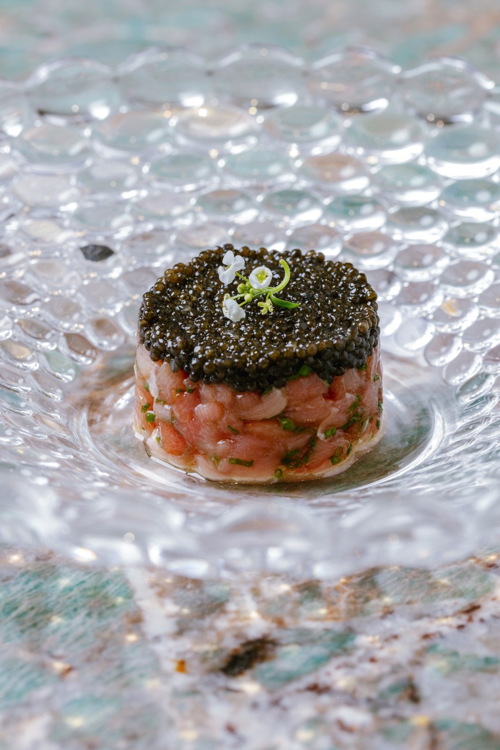 Tuna Tartare with Smoked Soy, Oscietra Caviar and Tapioca Chips.