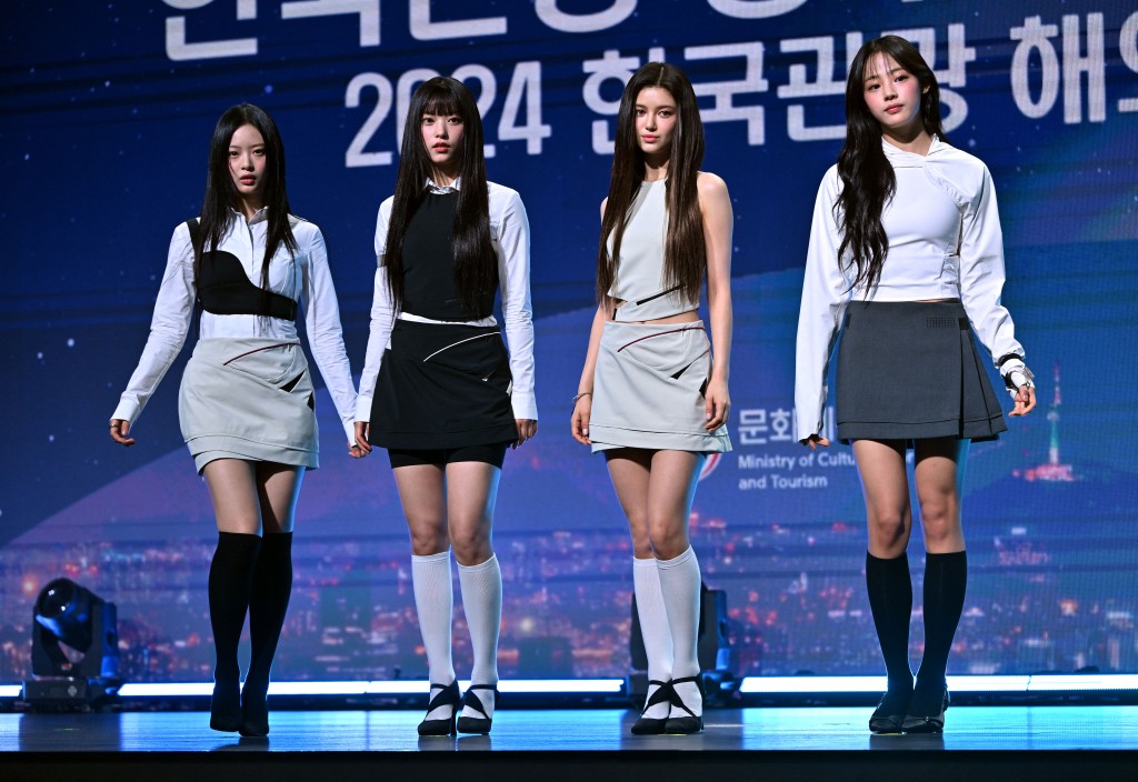 Photo by JUNG YEON-JE / AFP  pop girl group 'NewJeans' members Hanni, Haerin, Danielle and Minji attend an appointment ceremony of the 2024 Korea Tourism Honorary Ambassador at a hotel in Seoul on July 11, 2024.
