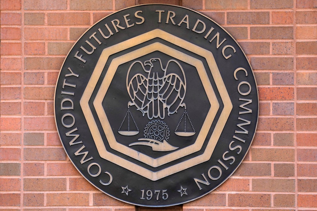 Signage is seen outside of the US Commodity Futures Trading Commission (CFTC) in Washington, D.C., U.S., August 30, 2020. REUTERS