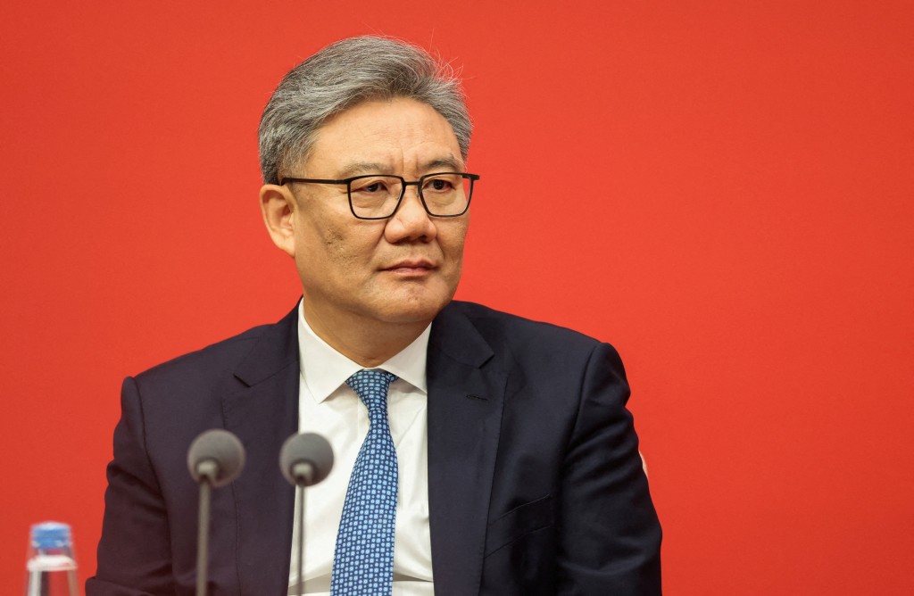 Chinese Commerce Minister Wang Wentao looks on during a press conference on the fourth plenum of the Chinese Communist Party Central Committee, in Beijing, China, October 24, 2025. REUTERS