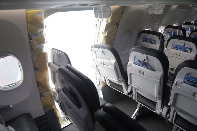 The fuselage plug area of Alaska Airlines Flight 1282 Boeing 737-9 MAX, which was forced to make an emergency landing with a gap in the fuselage, is seen during its investigation by the National Transportation Safety Board (NTSB) in Portland, Oregon, U.S. January 7, 2024. NTSB/Handout via REUTERS/File Photo
