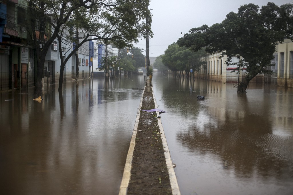 Photo by ANSELMO CUNHA / AFP  A flooded street is seen in Porto Alegre, Rio Grande do Sul State, Brazil, on May 24, 2024.