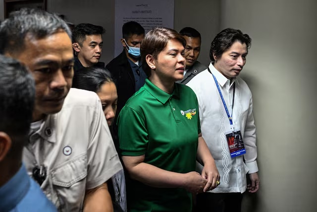 Philippine Vice President Sara Duterte arrives before the start of her impeachment trial hearing at the Senate of the Philippines in Pasay, Metro Manila, Philippines, July 7, 2026. REUTERS/Noel Celis/Pool