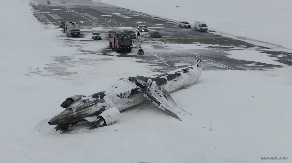 This image taken from video released by the Transportation Safety Board of Canada on Wednesday, Feb. 19, 2025, shows the crashed plane of Delta flight 4819 at Toronto Pearson International Airport, in Mississauga, Ontario, on Tuesday, Feb. 18. (Transportation Safety Board of Canada via AP) This image taken from video released by the Transportation Safety Board of Canada on Wednesday, Feb. 19, 2025, shows the crashed plane of Delta flight 4819 at Toronto Pearson International Airport, in Mississauga, Ontario, on Tuesday, Feb. 18. (Transportation Safety Board of Canada via AP)