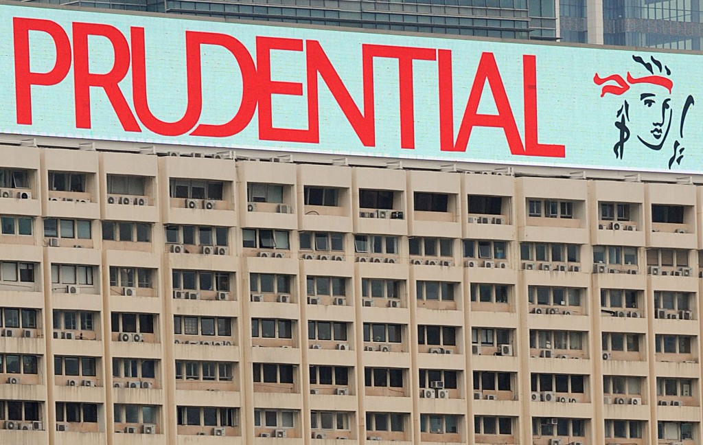 A picture shows a huge advertising board for British insuruer Prudential on the top of a building in Hong Kong. AFP