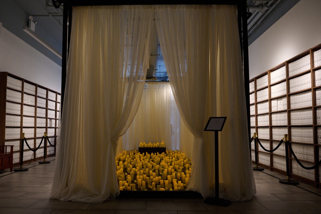 Hundreds of lit candles representing victims of sex trafficking are placed in the center of the main floor where the Institute for Primary Facts, a non-profit organization, opens a library archive of 3.5 million pages of the Epstein files that have been made available to the public at the Donald J. Trump and Jeffrey Epstein Memorial Reading Room in Tribeca on May 8, 2026 in New York City. People will be able to view the files from May 8 to 21, but access will be by appointment only. Edna Leshowitz/Getty Ima