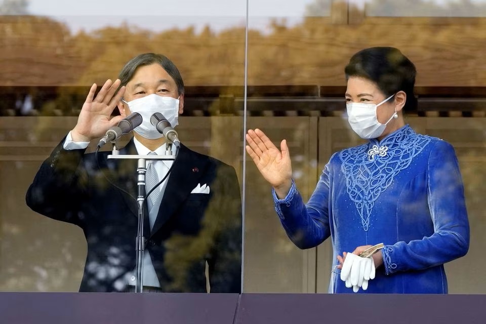 Japan's Emperor Naruhito accompanied with Empress Masako wave well-wishers as he appears on the balcony of the Imperial Palace to mark the emperor's 63rd birthday in Tokyo. (Reuters) Japan's Emperor Naruhito accompanied with Empress Masako wave well-wishers as he appears on the balcony of the Imperial Palace to mark the emperor's 63rd birthday in Tokyo. (Reuters)