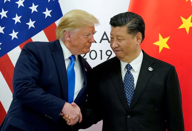 FILE PHOTO: U.S. President Donald Trump meets with China's President Xi Jinping at the start of their bilateral meeting at the G20 leaders summit in Osaka, Japan, June 29, 2019. REUTERS/Kevin Lamarque/File Photo/File Photo