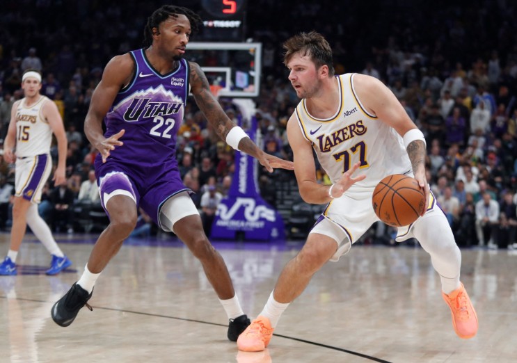 Luka Doncic works for a shot against Darryn Peterson of the Utah Jazz. AFP 